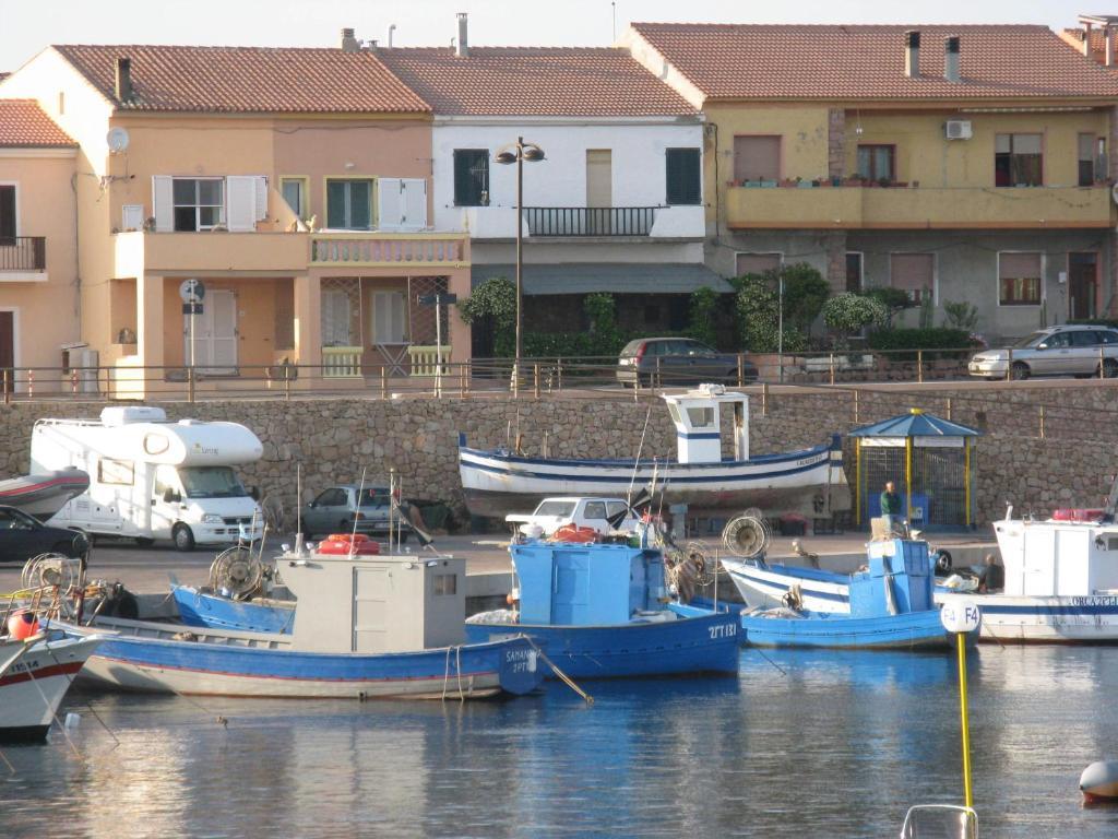 Borgo Spiaggia Vista Mare Isola Rossa Habitación foto