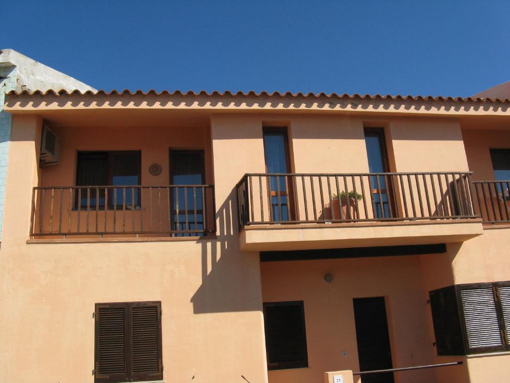 Borgo Spiaggia Vista Mare Isola Rossa Habitación foto
